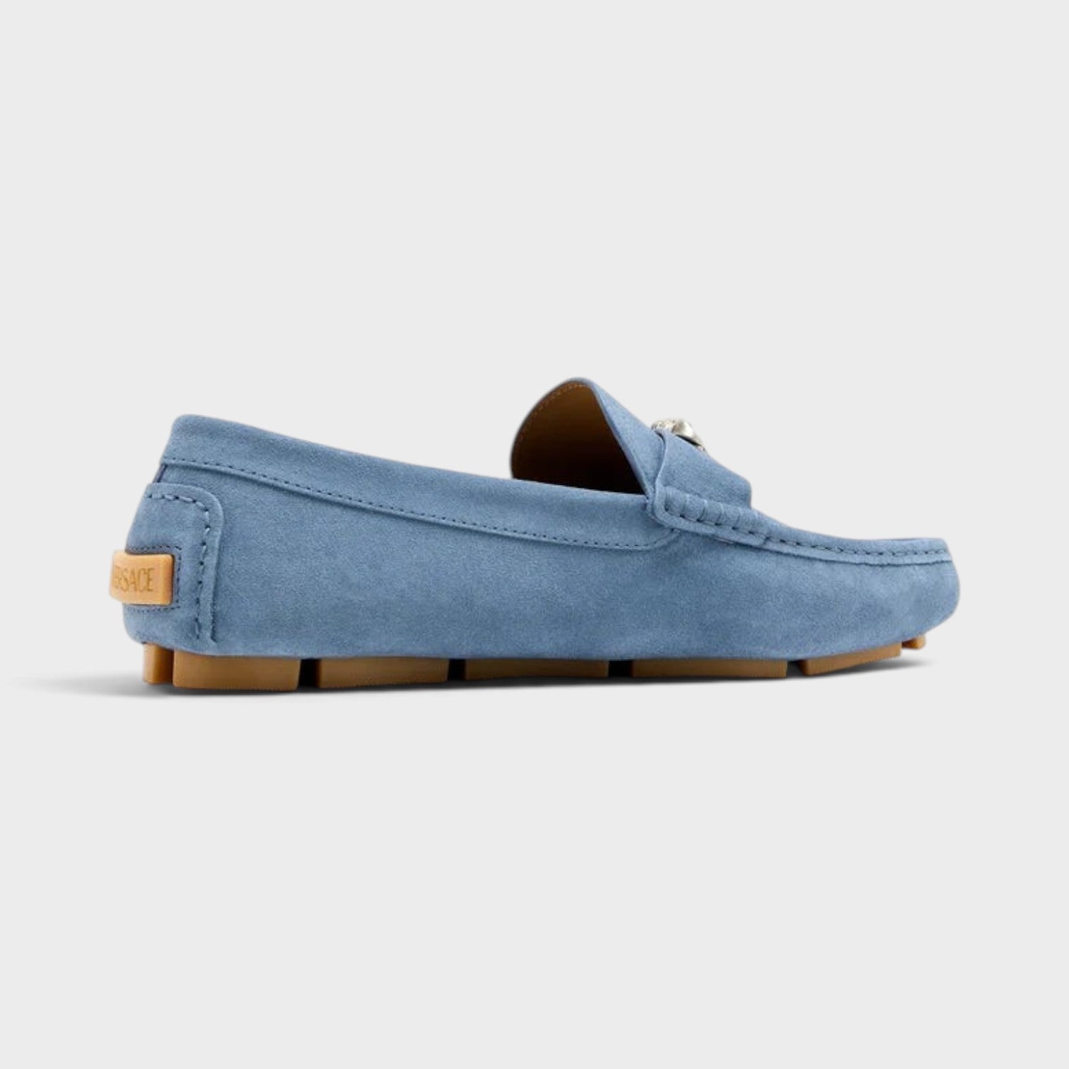 Supplied Fashion La Medusa stone blue suede driver loafers with iconic emblem and tan rubber sole side view