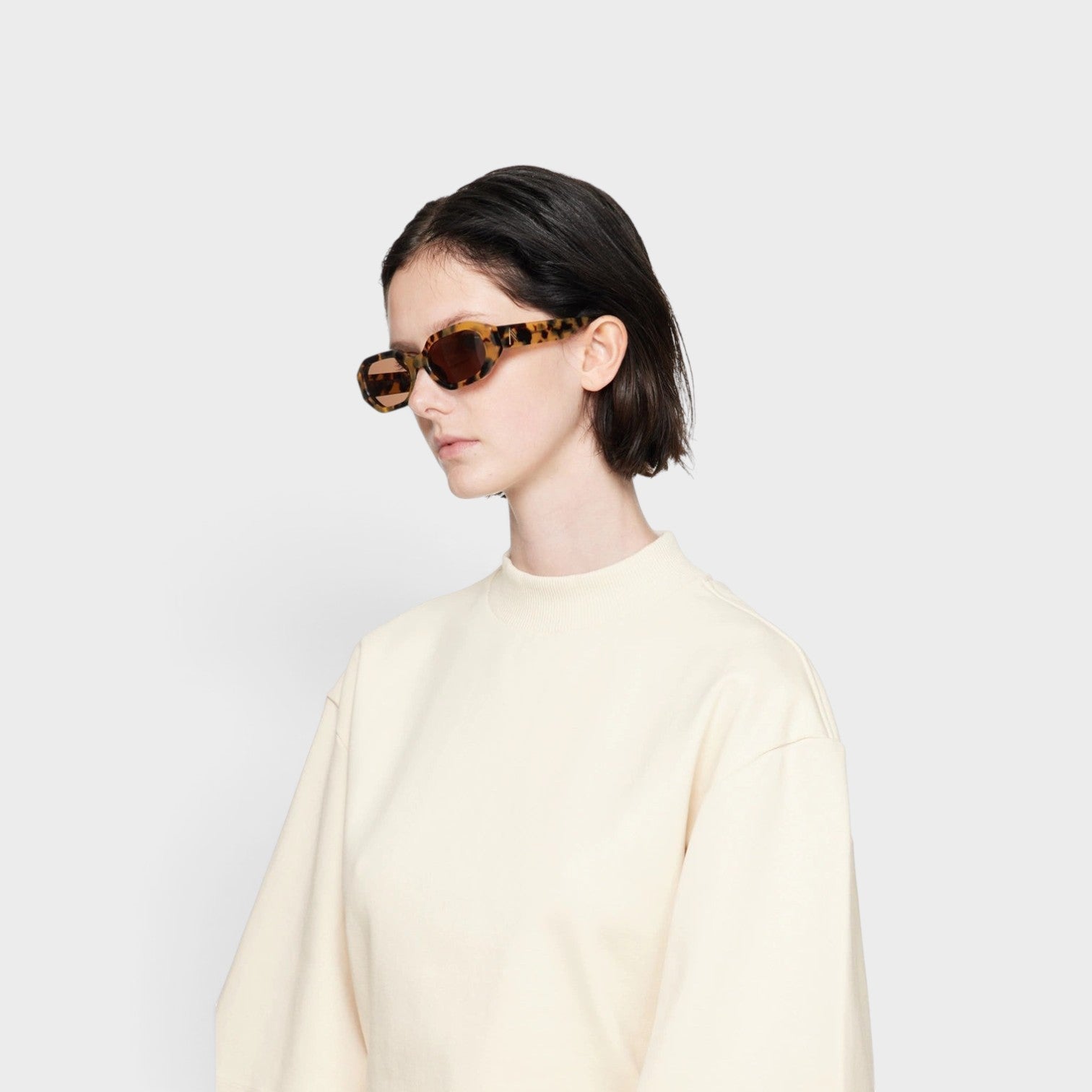 Supplied Fashion Linda Farrow Edition Irene sunglasses in tortoiseshell acetate worn by a model in a cream sweater