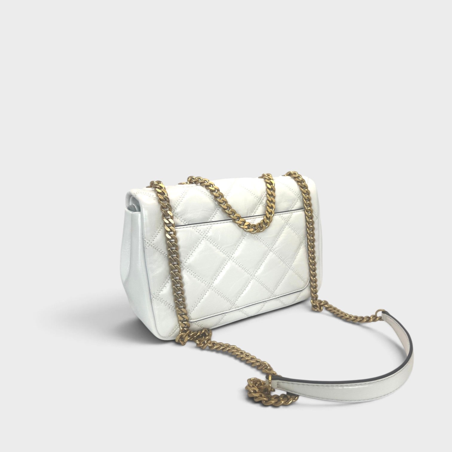 Supplied Fashion Willa glazed white leather shoulder bag with quilted texture and gold chain strap