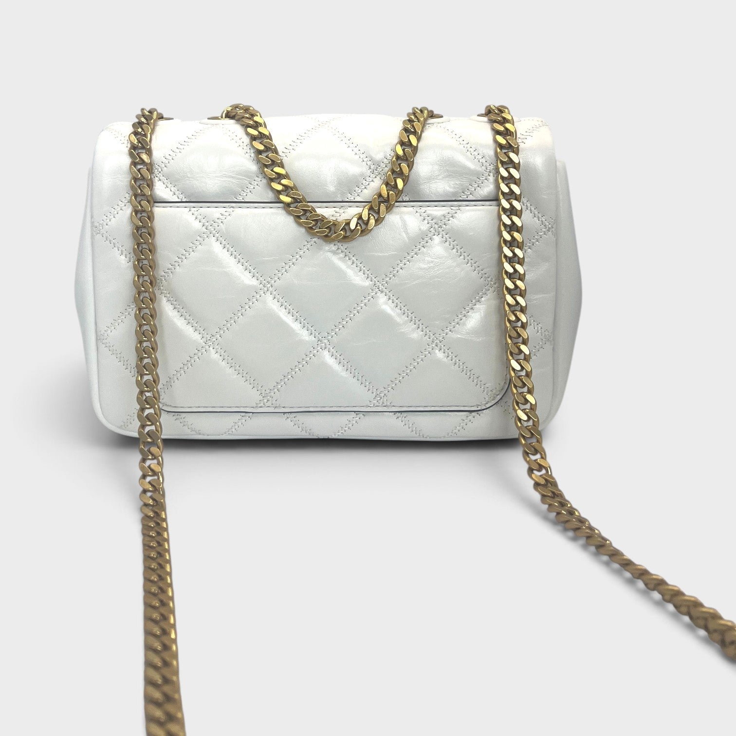 Supplied Fashion Willa glazed white leather shoulder bag with quilted texture and gold chain strap