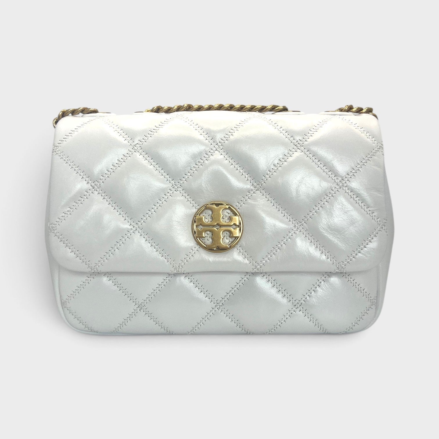 Supplied Fashion Tory Burch Willa small white glazed leather shoulder bag with quilted pattern and gold logo hardware.