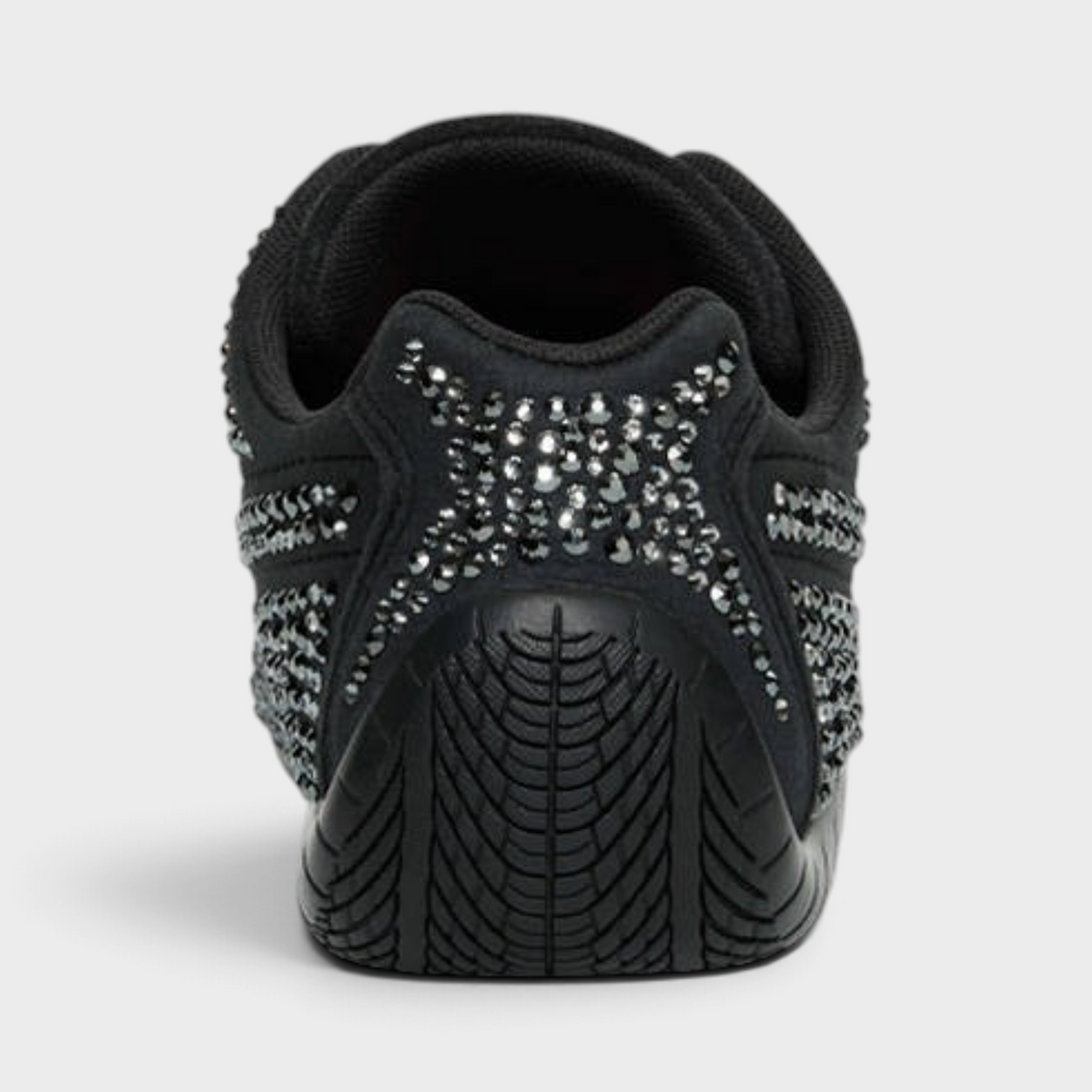 Supplied Fashion Puma X Swarovski Speedcat sneaker in black with crystal-embellished heel and treaded rubber sole.