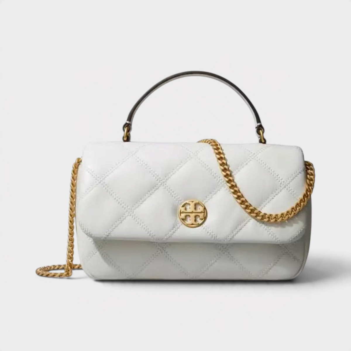 Supplied Fashion Willa white glazed leather mini top handle bag with gold chain strap and Tory Burch logo emblem.