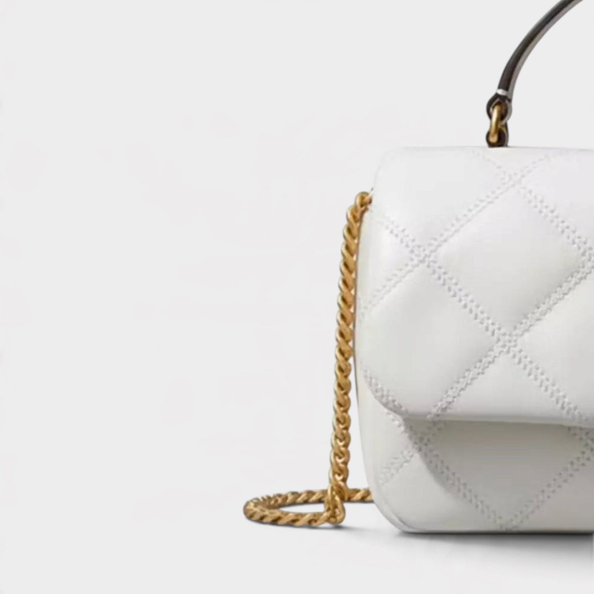 Supplied Fashion Willa white glazed leather mini bag with quilted texture and gold chain strap