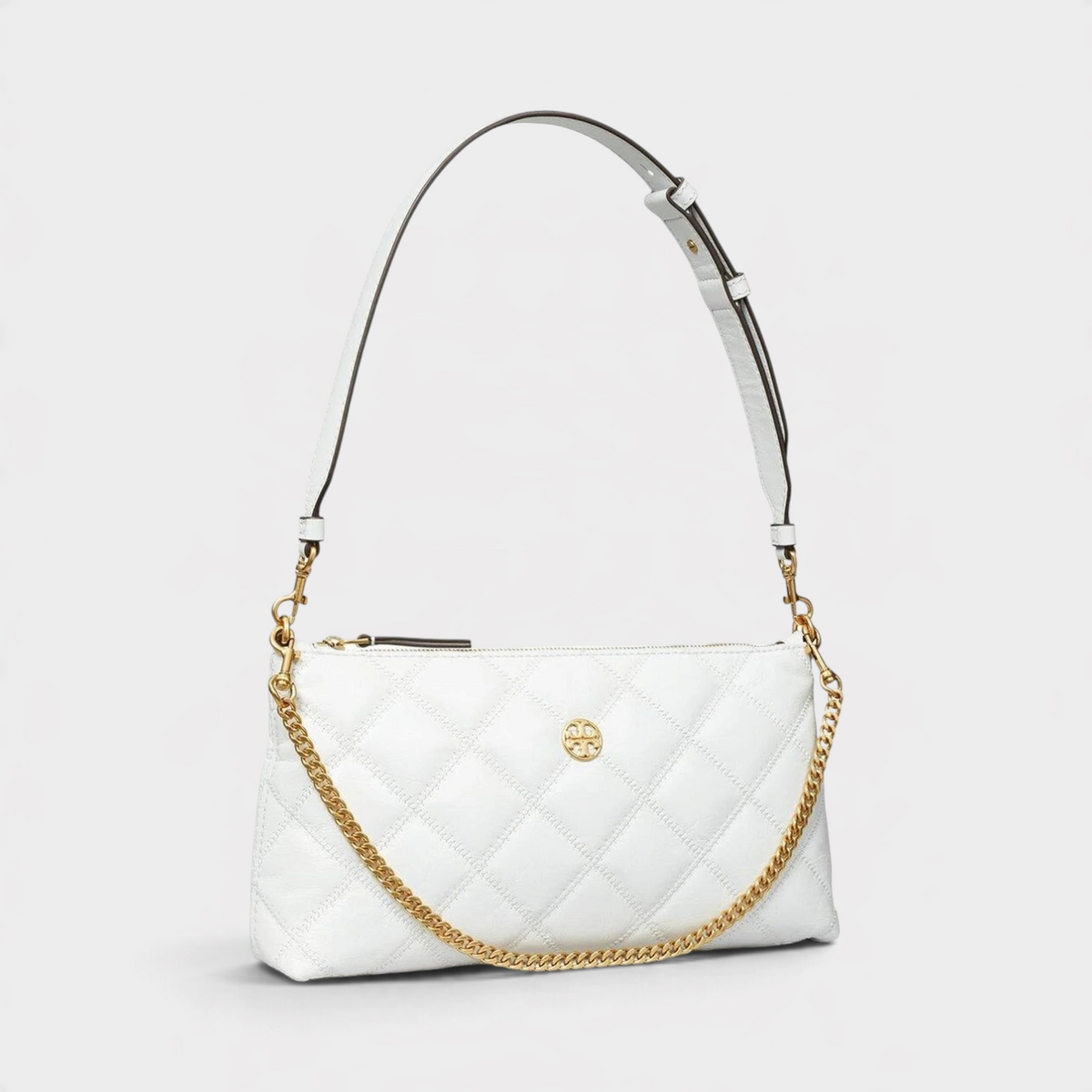 Supplied Fashion Willa white glazed leather shoulder bag with quilted texture, gold chain strap, and zip closure.