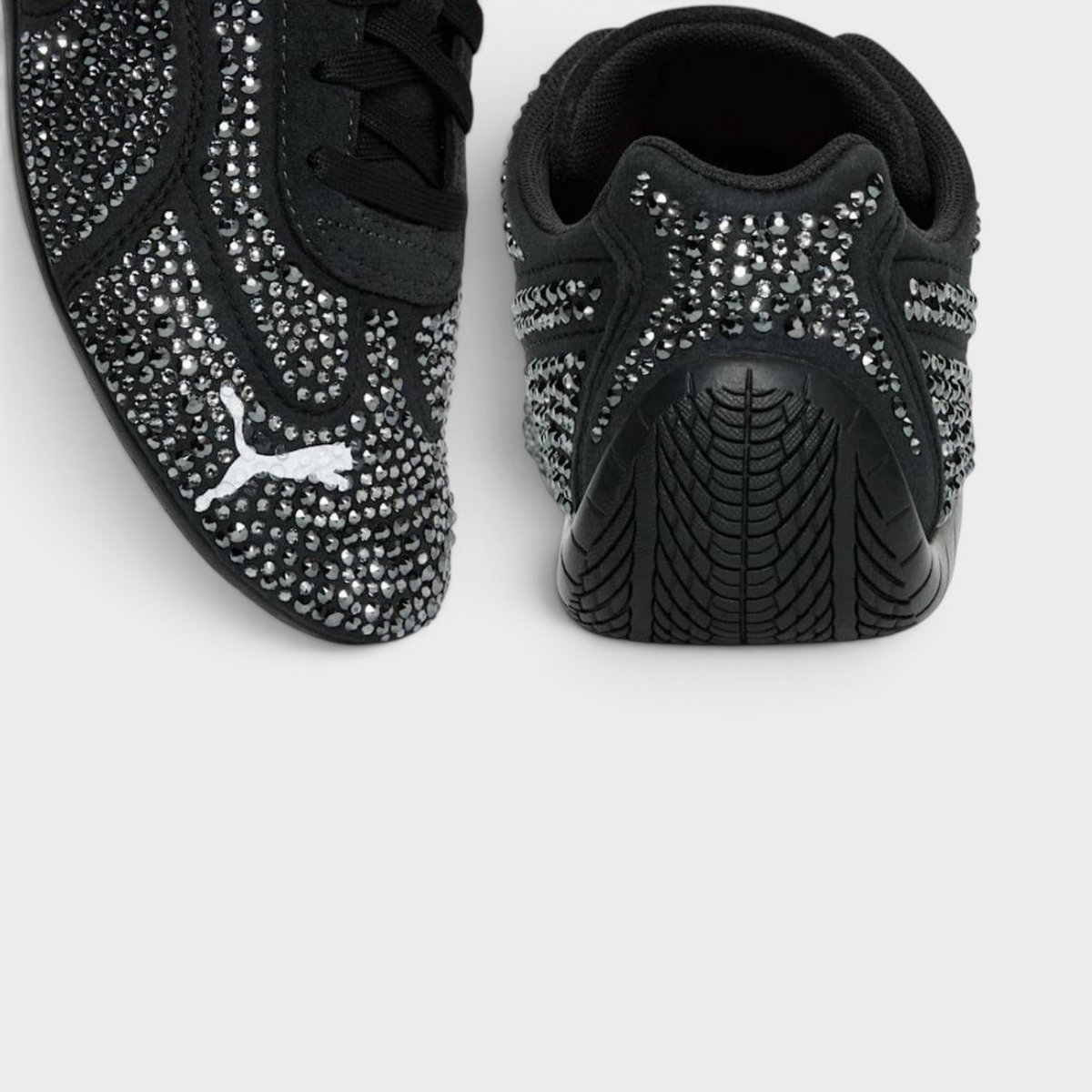 Supplied Fashion Puma X Swarovski Speedcat sneakers in black suede with hand-applied sparkling crystal embellishments.
