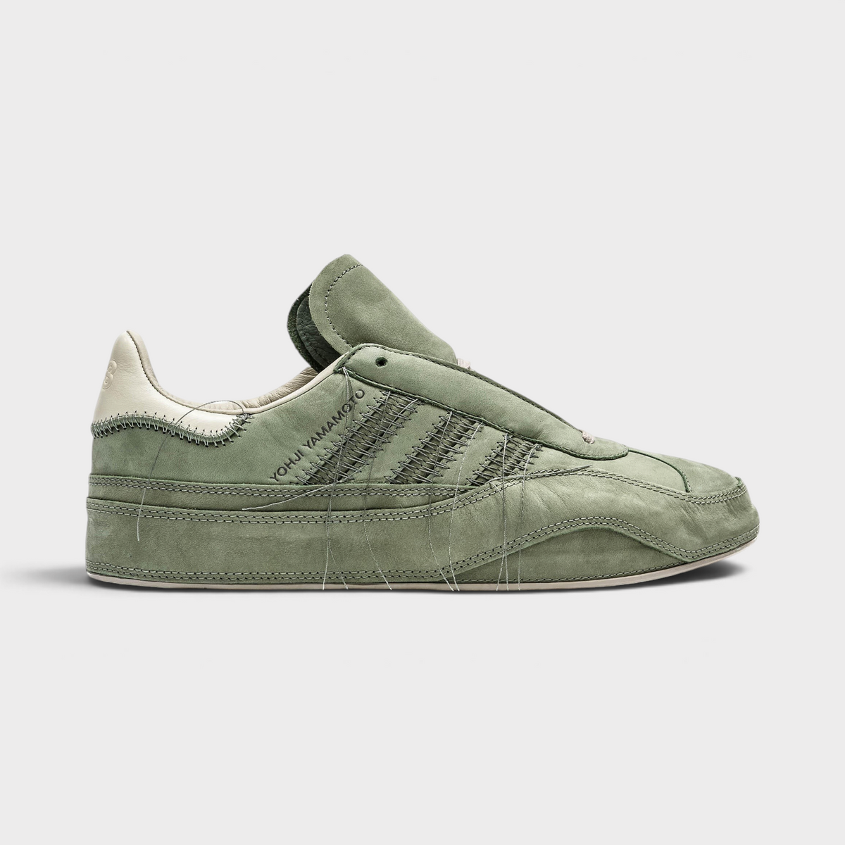 Supplied Fashion Adidas x Y-3 Gazelle sneaker in silver green suede with signature Yohji Yamamoto stitched detailing.