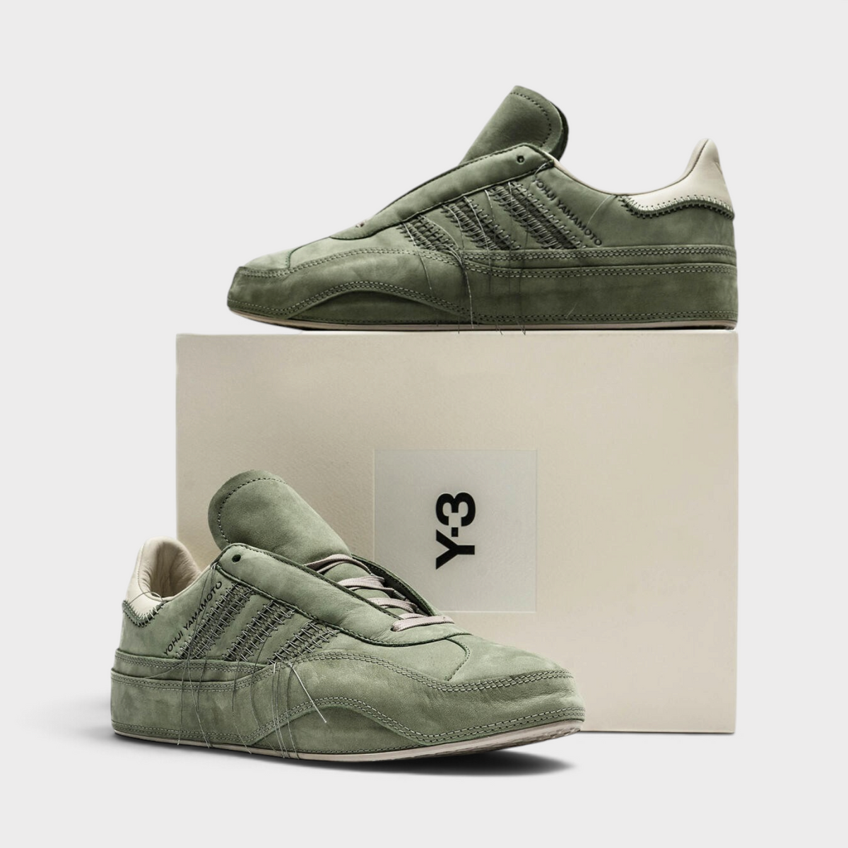 Supplied Fashion Adidas x Y-3 Gazelle sneakers in silver green suede with Yohji Yamamoto branding and off-white heel.
