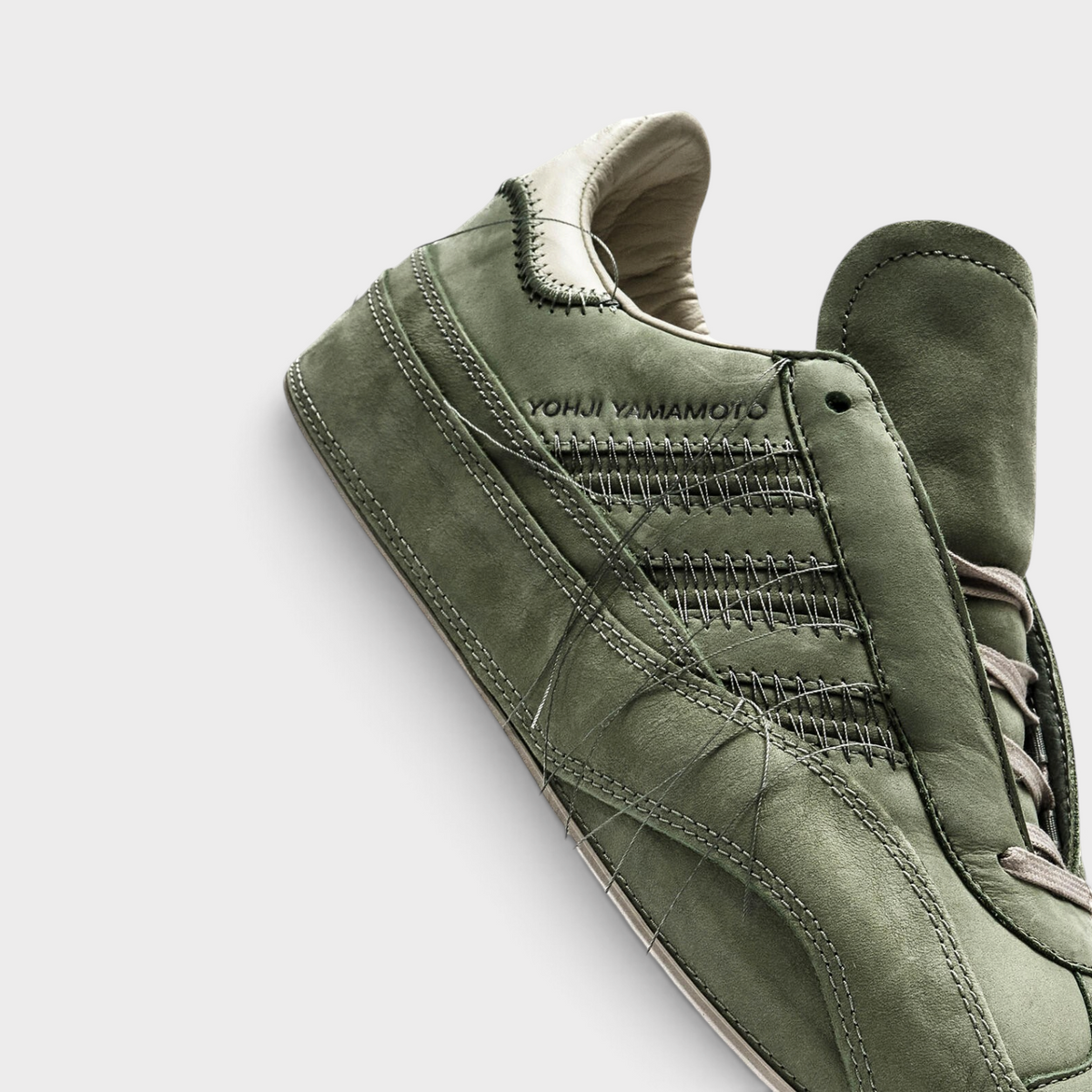 Supplied Fashion Adidas x Y-3 Gazelle sneaker in silver green suede with signature Yohji Yamamoto exposed stitching.